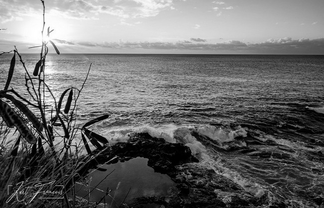 Beautiful Sunset from the cliffs of Albion with view on the natural pool