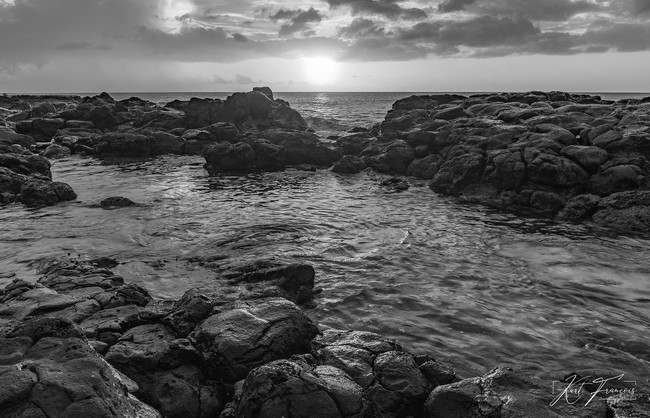 Rocky beach with beautiful sunset HDR photography
